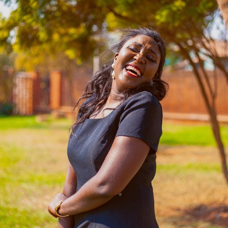Alex Rivera, Lead Design Curator at ElmZipLab, reviewing corporate floral arrangements